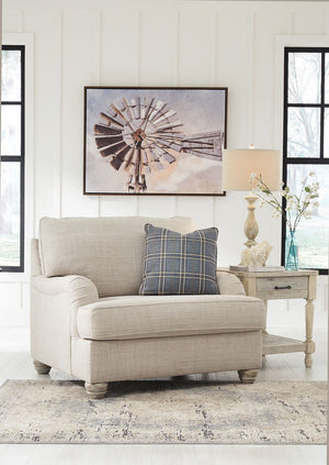  turn to this designer chair and ottoman. Wind down at the end of a long day when you sink into this canyon of comfort. <h4><b>Traemore - Linen - Chair and a Half</b></h4> <table width=-"100%-"><colgroup><col style=-"width: 