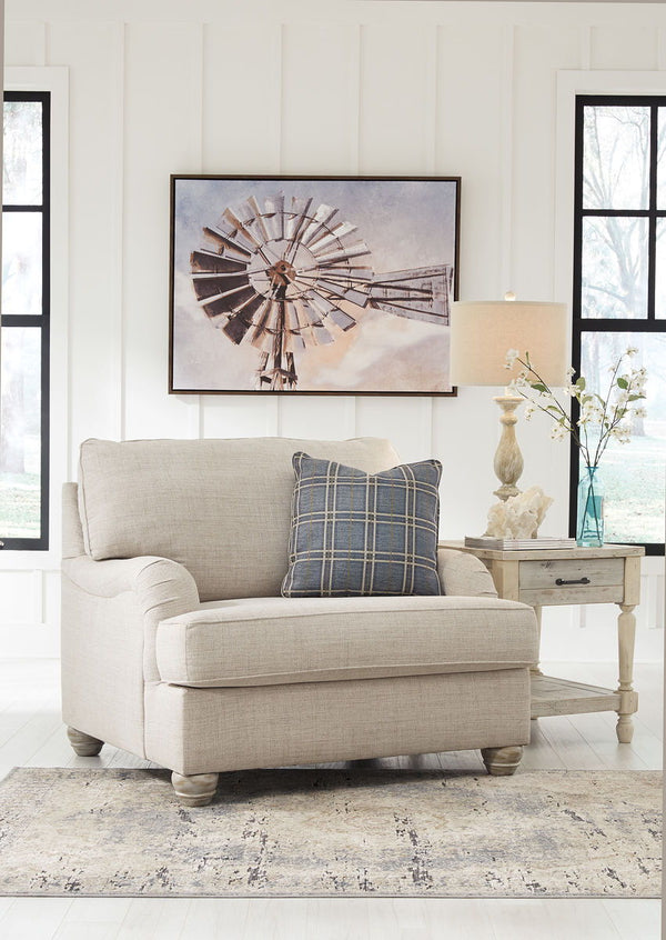  turn to this designer chair and ottoman. Wind down at the end of a long day when you sink into this canyon of comfort. <h4><b>Traemore - Linen - Chair and a Half</b></h4> <table width=-"100%-"><colgroup><col style=-"width: 