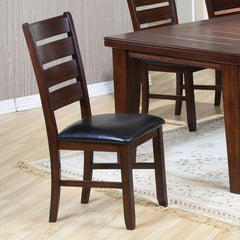 The Urbana Side Chair will complete a contemporary dining set or add a modern touch to a more traditional table. The durable wood construction features a slat-back design and a your choice of rich finish. The finish options complement the black seat uphol