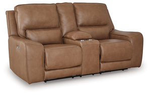 Live and lounge luxuriously. This power reclining loveseat brings an ultra-stylish flair to your homeâ€™s central hub. Its seating area is wrapped in top-grain leather in a rich caramel coloration, giving you a trend-right look made all the better with hi