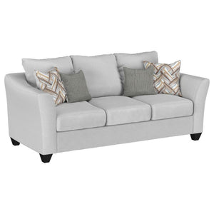 Inviting gray mist upholstery creates a rich, refined look and feel for a modern sofa. Plush cushions are filled with foam for excellent comfort. Accent pillows add both pattern and custom support when lounging and relaxing. The sofa boasts rounded arms t