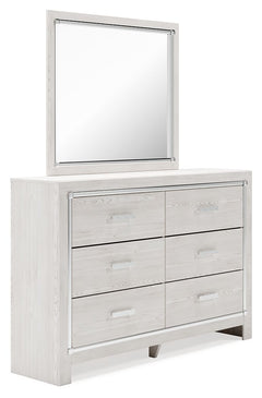 The epitome of fashion-forward design, this dresser with mirror set is a beautiful blend of comfort and luxury. Shiny chrome-tone accents, a pearlized finish and mosiac pulls bring a glam touch to the richly rustic appearance. Six smooth-gliding drawers p