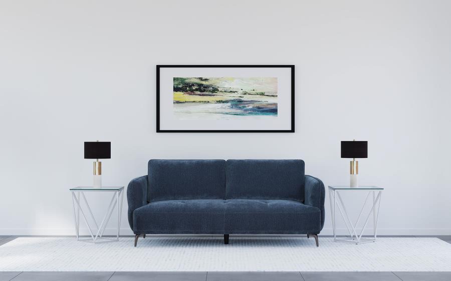 Introduce a modern touch of elegance to your living space with this stunning sofa that captures attention from every angle. Featuring curves in all the right places and an alluring back profile, this sofa is a perfect blend of style and comfort. The deep 
