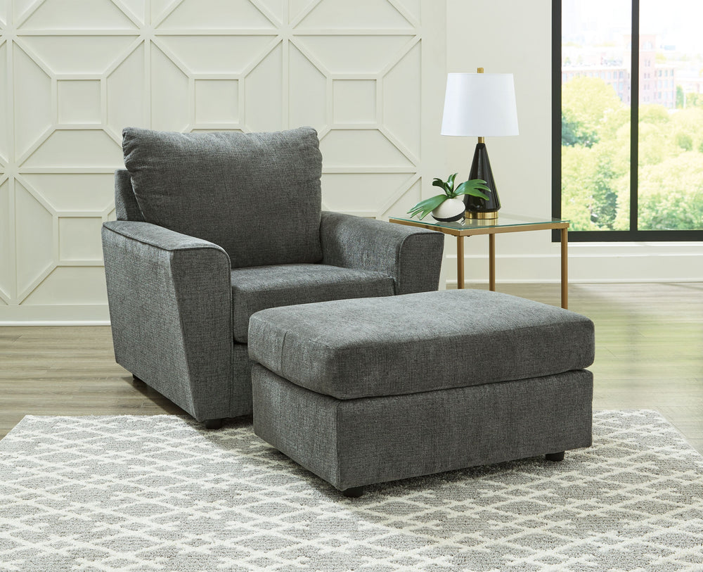 Whatâ€™s new in neutrals? Shades of gray, of course. Embrace this sophisticated design trend with this gorgeous chair and ottoman, which offers a clean-lined, contemporary style at a comfortably cool price. Sure to lift your spirits, the plush chenille fa
