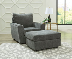 Whatâ€™s new in neutrals? Shades of gray, of course. Embrace this sophisticated design trend with this gorgeous chair and ottoman, which offers a clean-lined, contemporary style at a comfortably cool price. Sure to lift your spirits, the plush chenille fa