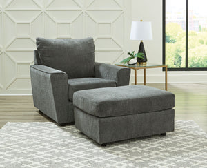 Whatâ€™s new in neutrals? Shades of gray, of course. Embrace this sophisticated design trend with this gorgeous chair and ottoman, which offers a clean-lined, contemporary style at a comfortably cool price. Sure to lift your spirits, the plush chenille fa