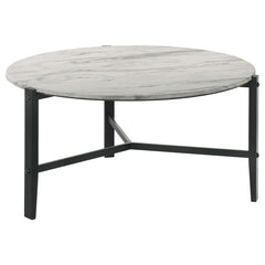 Create a minimal aesthetic in your living room with this modern coffee table. Slim black solid rubberwood legs form a stand-like base that supports a spacious round top. The high-pressure laminate top features a faux white marble design with textured stri