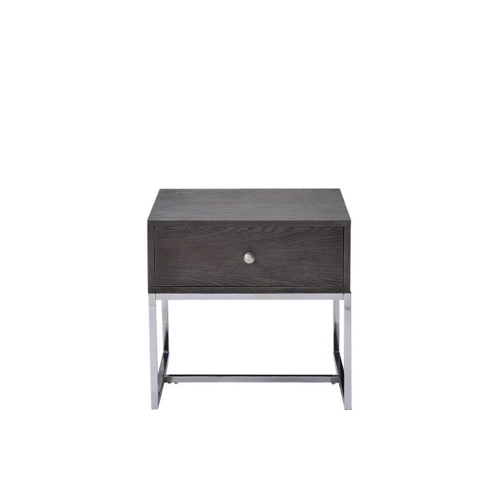 Maximize your living space with the attractive Iban End Table. Designed for with both function and style, this rectangular occasional table features a rich gray oak finish and a sturdy, metal sled base. The minimalist style and neutral color scheme create