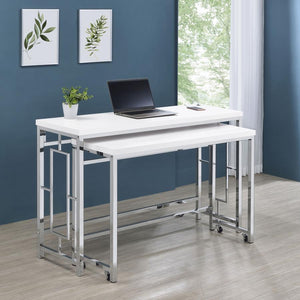 You-'ll fall in love with the versatility and impeccable styling of a contemporary four-piece counter height dining table set that includes two nesting tables and two backless stools. Whether you-'re dining or working from home, the set is designed to imp