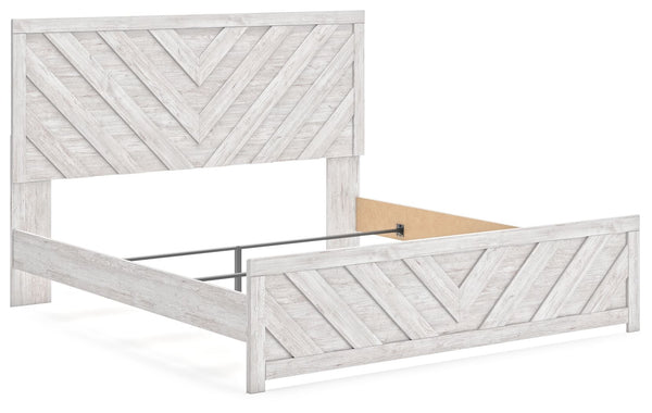  this king panel bed embraces the aesthetics of countryside living and repurposes them for modern settings. Its whitewash paint