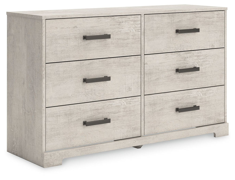 Give casual a new meaning with the chic look of this dresser. A light gray finish over replicated oak grain keeps it laid-back and inviting, while substantial pulls in a warm pewter tone add a modern farmhouse touch. Spacious drawers give you plenty of ro