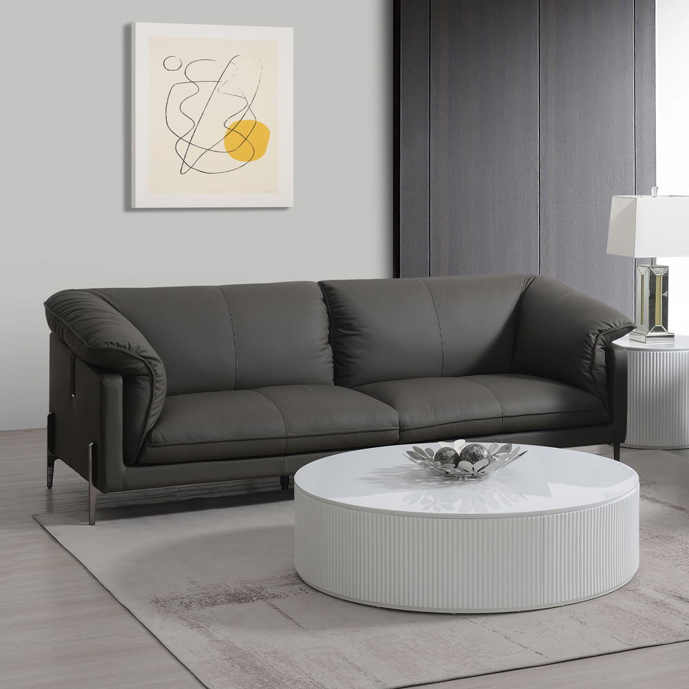 Tadi collection sofa in black leather exudes modern elegance and sophistication. With its clean lines and plush seating, it offers a perfect blend of comfort and style. Ideal for contemporary living spaces, the Tadi sofas provide a luxurious feel, making 