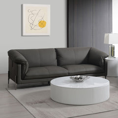 Tadi collection sofa in black leather exudes modern elegance and sophistication. With its clean lines and plush seating, it offers a perfect blend of comfort and style. Ideal for contemporary living spaces, the Tadi sofas provide a luxurious feel, making 