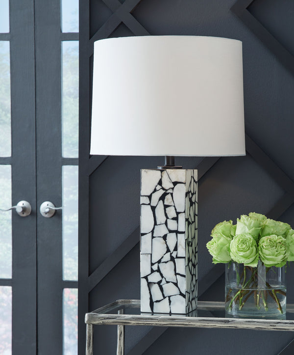  with a mosaic pattern of white marble playing beautifully against a black background. Complemented by a modified drum shade for a sophisticated sensibility