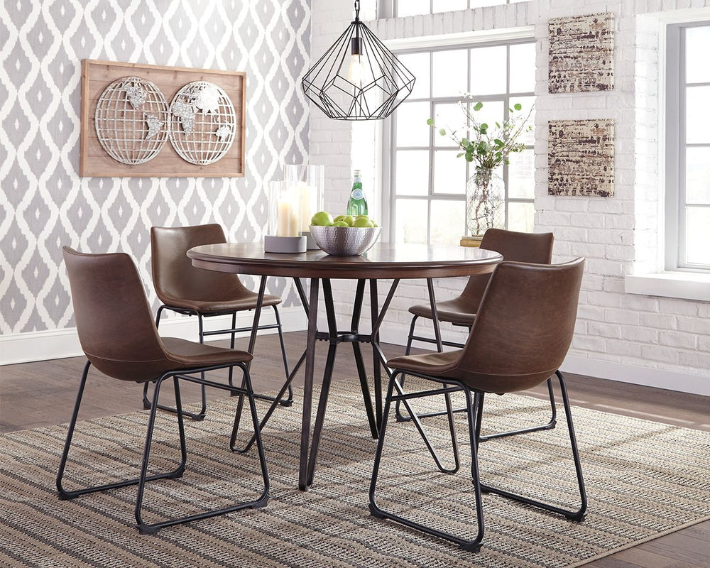 With its distinctive tubular metal base, this dining table serves up a fresh twist on mid-century inspired style. The mixed materials and two-tone aesthetic are beautifully in balance. What a timeless look for eat-in kitchens and casually cool dining room