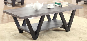  angular design and practical features. A rectangular grey wood-look top and lower shelf
