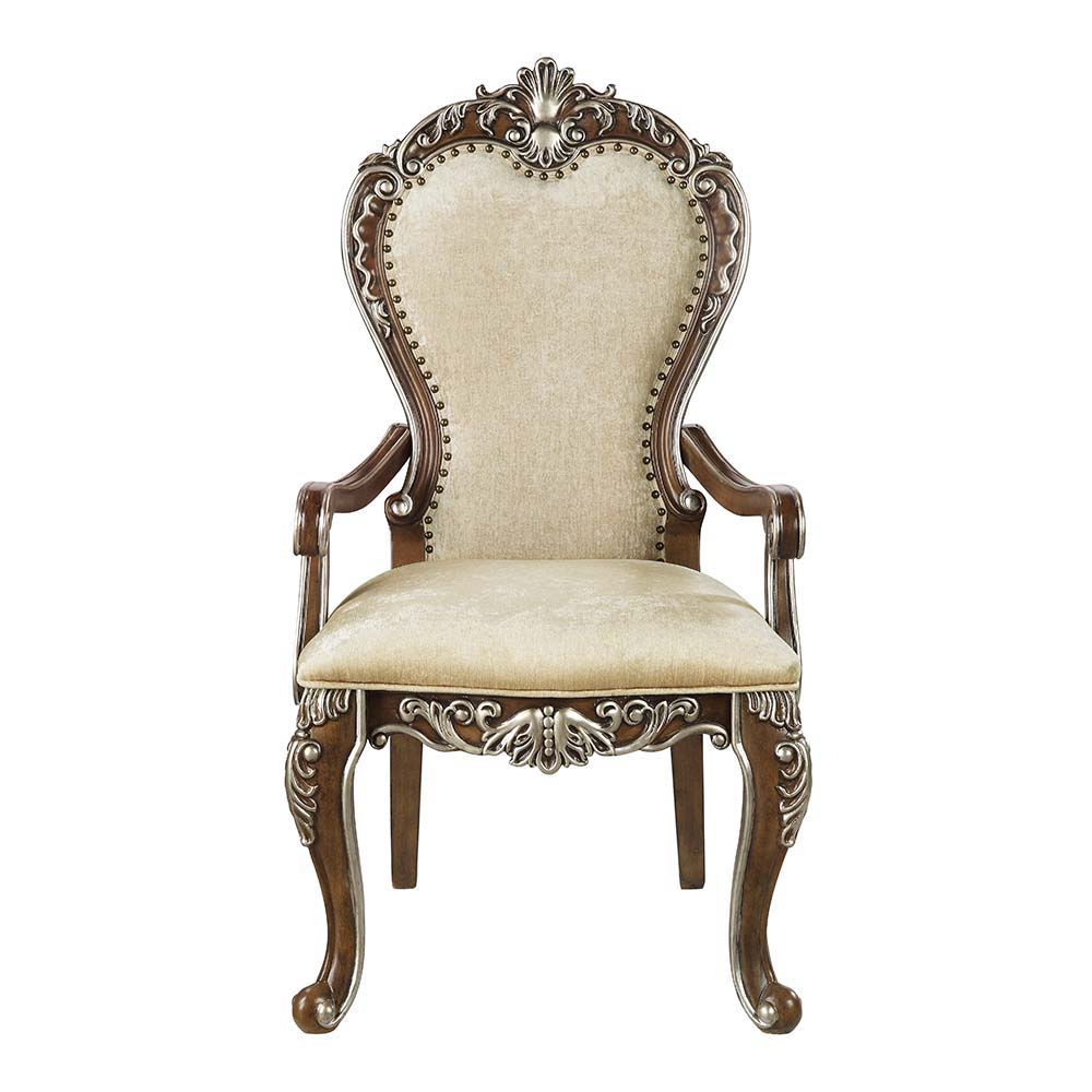 The Latisha armchairs bring comfort and elegant traditional style into your dining room. With plush seat cushions and padded backrests, dinner parties will surely last for hours. Against the antique oak, the floral moldings are highlighted with silver han