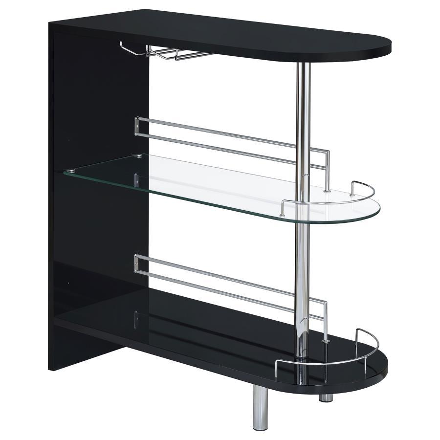 This stylish bar unit is a fabulous option for your entertaining needs. A sleek silhouette and glossy black finish give it a chic, modern appeal. Its tempered glass storage shelves offer a handy place to display a collection of fine wines and spirits. Pro