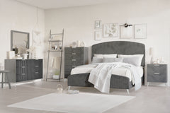 The Kailani 6 Piece Bedroom Set in Gray combines modern elegance, luxurious comfort, and practical functionality, creating the ultimate solution for a stylish and serene bedroom retreat. This set includes an upholstered panel bed, dresser, mirror, chest, 