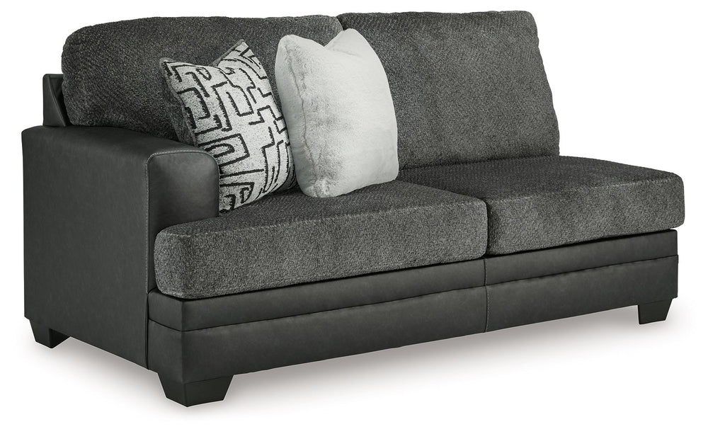 This left-arm facing sofa is made with polyester and faux leather upholstery. Pairs with other items in the series to make a sectional.<br><br><b>Additional Dimensions</b><br><ul><li>Arm height: 27-"</li><li>Seat depth: 23-"</li><li>Seat height: 21-"</li>