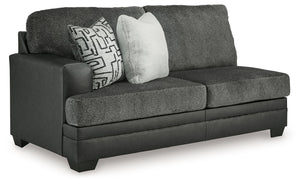 This left-arm facing sofa is made with polyester and faux leather upholstery. Pairs with other items in the series to make a sectional.<br><br><b>Additional Dimensions</b><br><ul><li>Arm height: 27-"</li><li>Seat depth: 23-"</li><li>Seat height: 21-"</li>