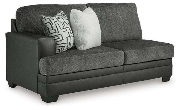 This left-arm facing sofa is made with polyester and faux leather upholstery. Pairs with other items in the series to make a sectional.<br><br><b>Additional Dimensions</b><br><ul><li>Arm height: 27-"</li><li>Seat depth: 23-"</li><li>Seat height: 21-"</li>