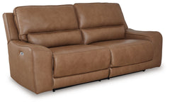 Live and lounge luxuriously. This power reclining sofa brings an ultra-stylish flair to your homeâ€™s central hub. Its seating area is wrapped in top-grain leather in a rich caramel coloration, giving you a trend-right look made all the better with high-q