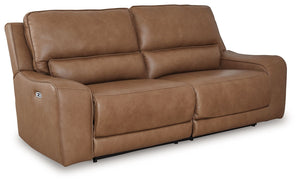 Live and lounge luxuriously. This power reclining sofa brings an ultra-stylish flair to your homeâ€™s central hub. Its seating area is wrapped in top-grain leather in a rich caramel coloration, giving you a trend-right look made all the better with high-q