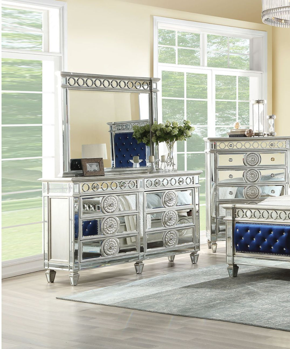 The Varian dresser provides a commanding presence in any room. Add a dash of glam to your bedroom with this Varian dresser, this dresser features four tapered legs and 8 storage drawers with crystal-like knobs. This gorgeous dresser is accented with raise