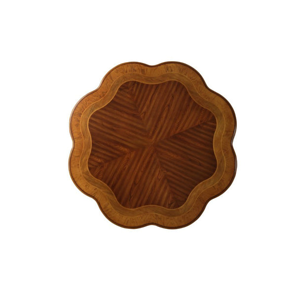 and is supported by a pedestal with oversized scrolled legs with antique hand-brushed finish