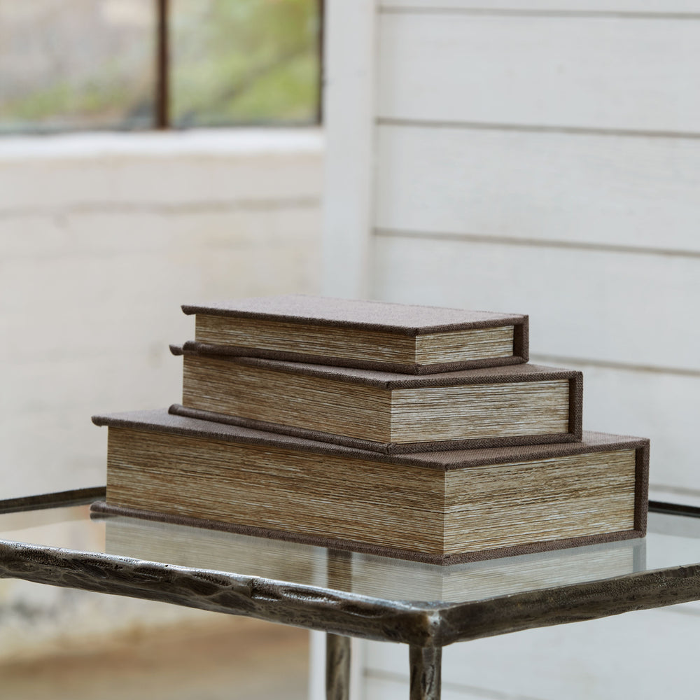 This set of three keepsake boxes makes storage so quietly understated. The brown cover is complemented inside with a black velvet lining. The perfect place for your dearest keepsakes, this set adds a touch of casual elegance to your decor.<br><br><b>Addit