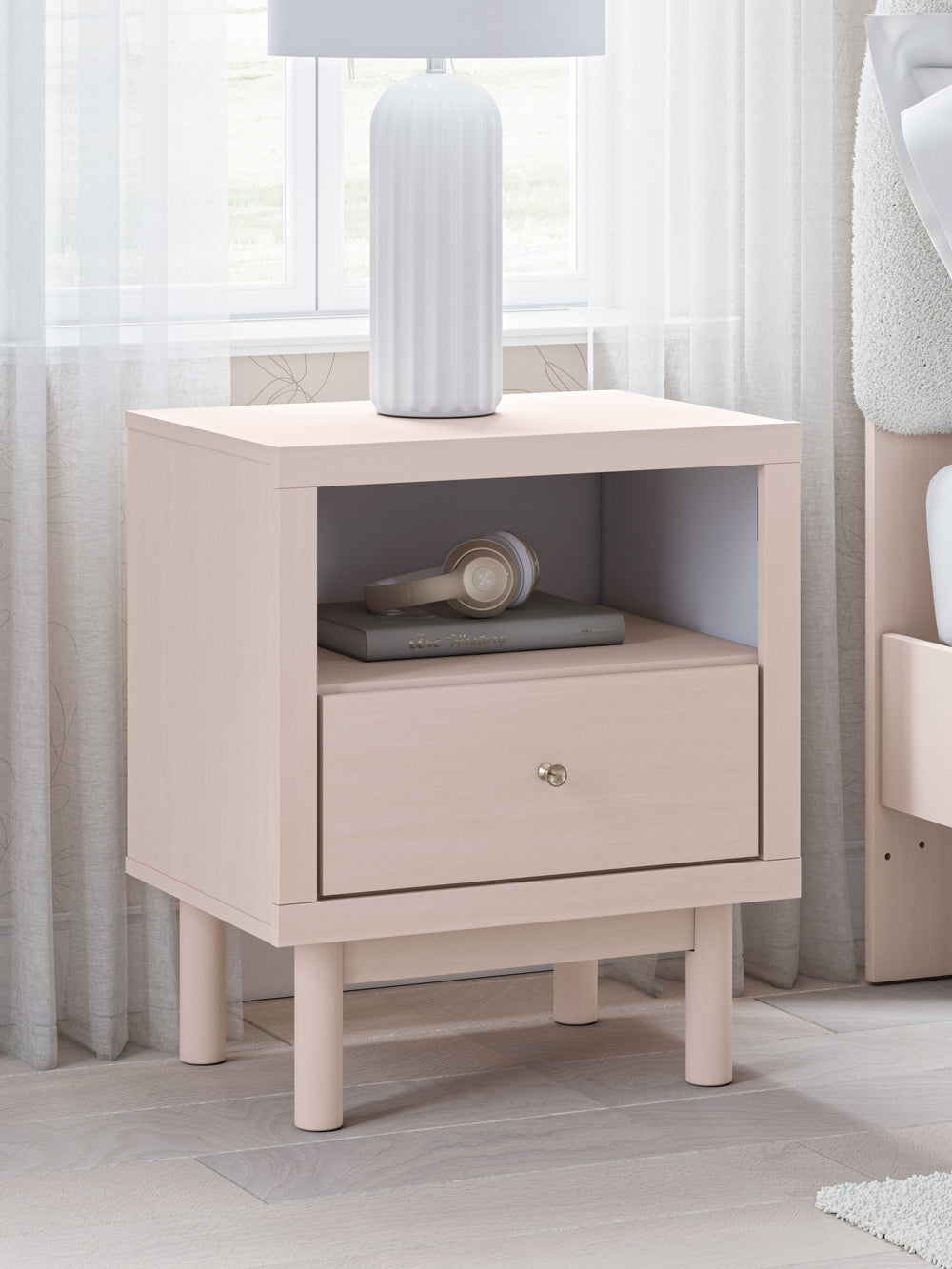 Pretty in pink. This nightstand keeps the spirit of your homeâ€™s modern aesthetic while suiting all your young oneâ€™s needs. Its subtle blush finish brings a playful, charming vibe to organizing bedside essentials, while USB charging keeps devices ready
