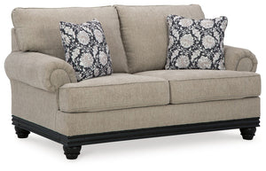 This loveseat suits those searching for a fresh take on versatile style, seamlessly transitioning from casual to modern with your decor. Its flexible character comes courtesy of a chunky fabric. Matte black wood trim creates innovative contrast. A virtuos