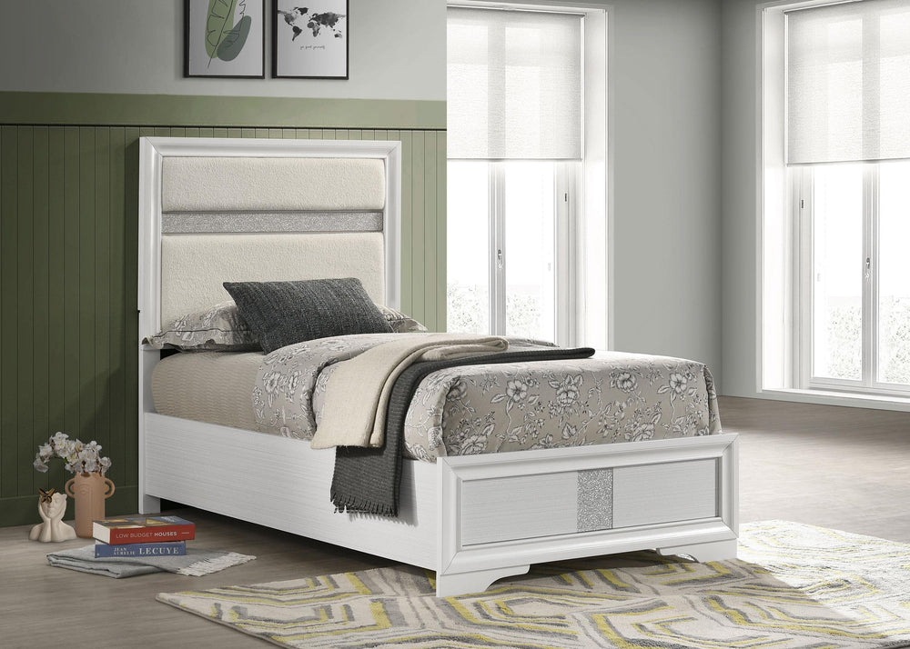 Introduce a little bit of glam flair to your bedroom with a modern upholstered bed. Featuring padded white fabric panels, the headboard is complete with molded trim and a horizontal stripe that glitters in the light. A matching vertical stripe on the low 