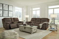 Kick back, relax, and enjoy some sports on TV with this reclining collection. You will love its double stuffed pillow top arms and soft-as-suede faux leather upholstery. Family-friendly espresso color and creative stitching add panache. Recline in comfort