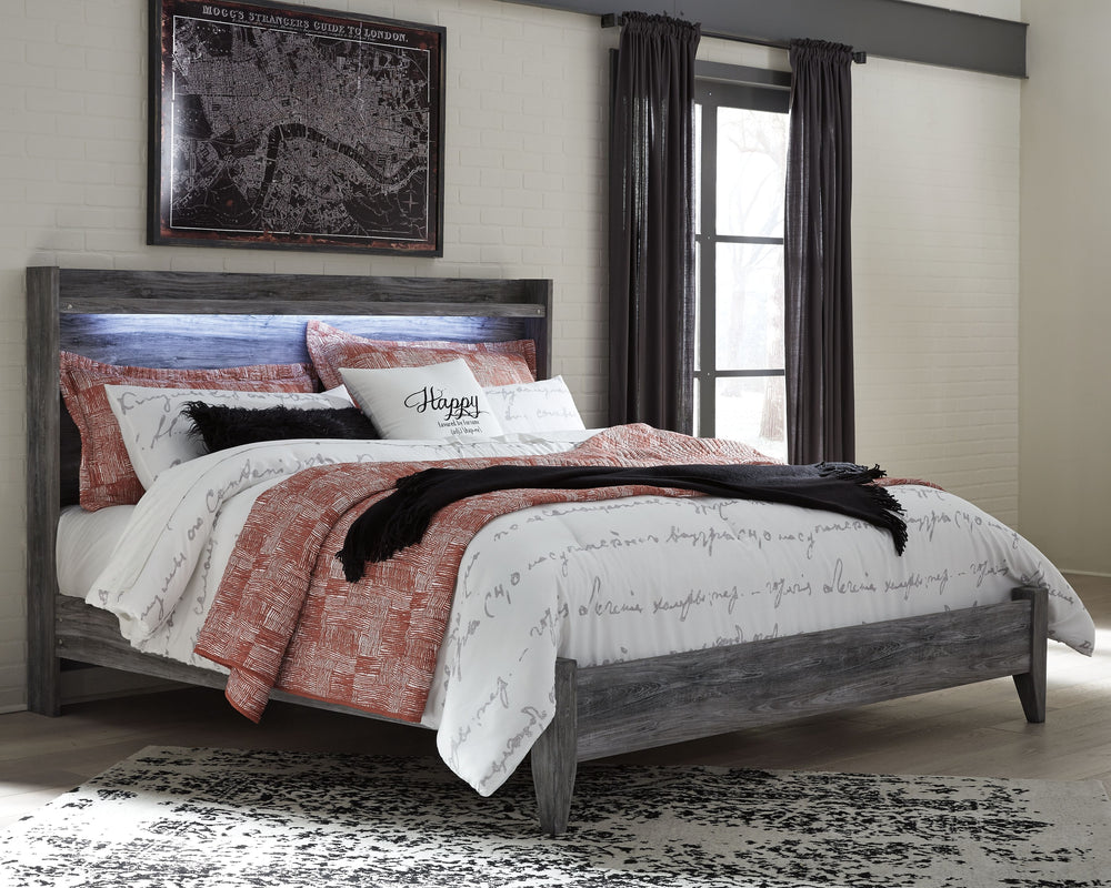 Rest in the beachy style of this king panel bed. Its driftwood and surfer-inspired smoky finish gives this bed a rustic look that-'s perfect for creating an island escape in the room. Clean lines and modern charm blend for an authentic look to be enjoyed 