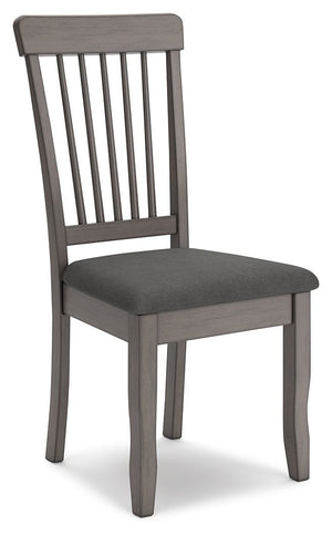 Serve up casual elegance with this dining chair. Its approachable character ushers a relaxed feel into kitchen nooks and small dining rooms. Design details like a spindle back elevate the look, with contrasting gray hues lending a monochromatic, modern ed