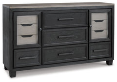 This dresser is casual contemporary style simply done right. Its two-tone color scheme features a rich brushed black main color accented with a beautiful dusty grayish brown wood tone. With 11 soft-close drawers (three located neatly behind each door) thi