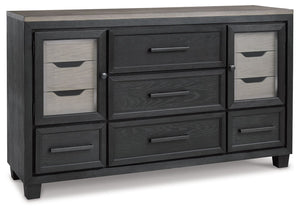 This dresser is casual contemporary style simply done right. Its two-tone color scheme features a rich brushed black main color accented with a beautiful dusty grayish brown wood tone. With 11 soft-close drawers (three located neatly behind each door) thi