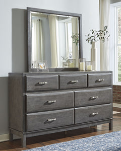Contemporary style is shaping up beautifully. Designer elements are evident from every angle in this dresser and mirror. Quality crafted with dovetail construction, the dresserâ€™s contoured drawers offer ample storage options. Sleek and understated, this