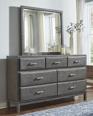  veneers and engineered wood. Contoured drawer fronts with pressed veneer face. Dovetail drawer construction with metal center guides. Stylish metal bar pulls. Captain-'s style storage bed features 