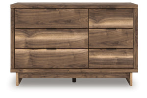  while the angular base incorporates contemporary motifs. Integrated drawer handles round ou