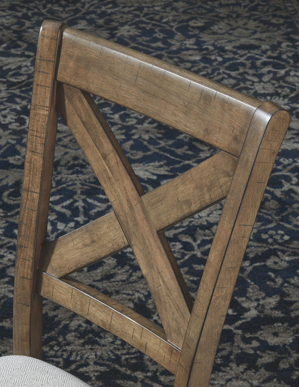  this upholstered dining chair with classic X back styling entices with warmth and earthy elegance