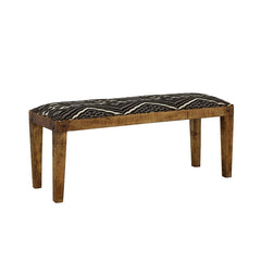 Elevate your space with this modern rustic bench, blending natural wood tones with bohemian-inspired upholstery. The solid mango wood frame showcases a rich, exposed grain, accented by decorative nailhead details for added charm. A bold black-and-white ge
