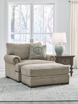 Looking to enhance your home-'s visual appeal? This oversized chair with ottoman set offers sophisticated design, comfort and elegance with tonal colors, roll arms and nailhead accents. Enjoy optimal coziness as you nestle into luxurious soft upholstery a