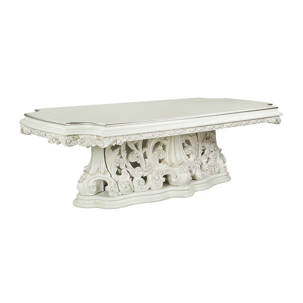 Exuding elegance and refinement, the Adara dining table is designed after the elaborate Rococo style. The single pedestal base is elaborate and commands the attention of everyone. Leave guests stunned with its beauty. Floral and leaf motives make up the c