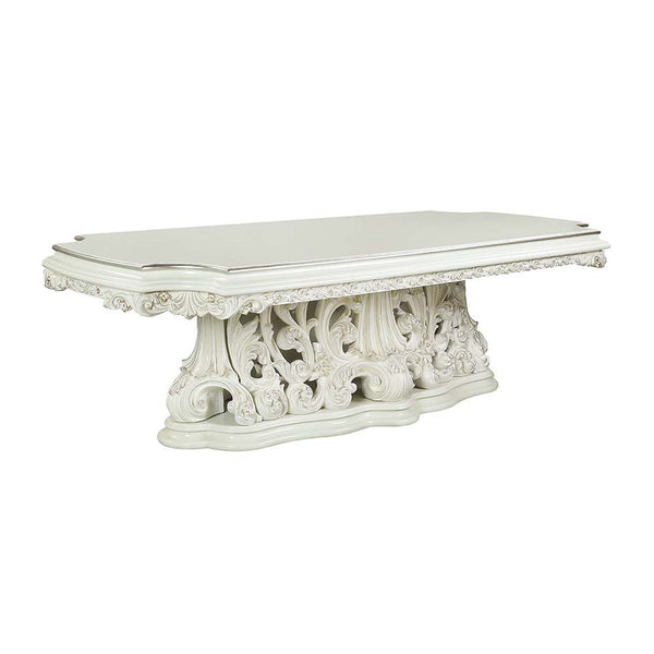 Exuding elegance and refinement, the Adara dining table is designed after the elaborate Rococo style. The single pedestal base is elaborate and commands the attention of everyone. Leave guests stunned with its beauty. Floral and leaf motives make up the c