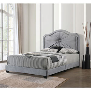 The Frankie bed provides a commanding presence in any room. This contemporary panel bed features a fully padded arched headboard with low profile footboard in a luxurious gray fabric. The headboard is accented with Single Button Tufted & Nail-head Trim. T