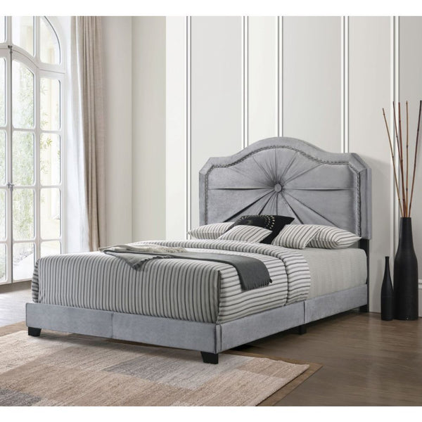 The Frankie bed provides a commanding presence in any room. This contemporary panel bed features a fully padded arched headboard with low profile footboard in a luxurious gray fabric. The headboard is accented with Single Button Tufted & Nail-head Trim. T