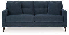 Feed your mid-century modern nostalgiaâ€”with a contemporary twist. A vibrant trend-right hue and comfy feel make this sofa perfect for lounging solo or with friends and family. Its linear profile adds plenty of fresh style, and the tapered accent legs ar